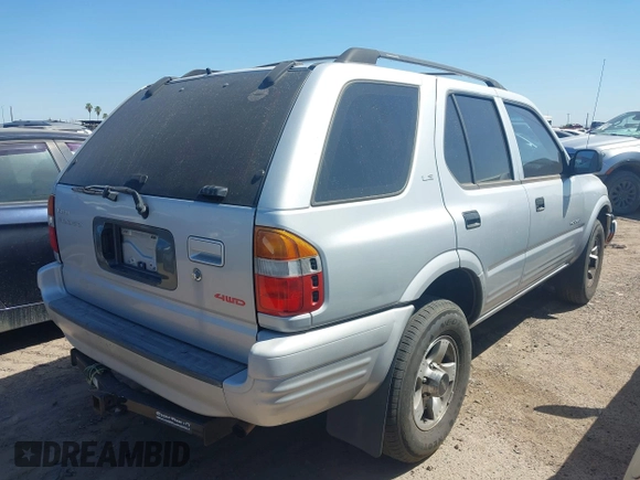 1999 Isuzu Rodeo S with VIN 4S2CM58W9X4354789, listed as a IAAI auction lot 42444956 with Not provided miles and . Bid and sale history available at DreamBid. Image 4.