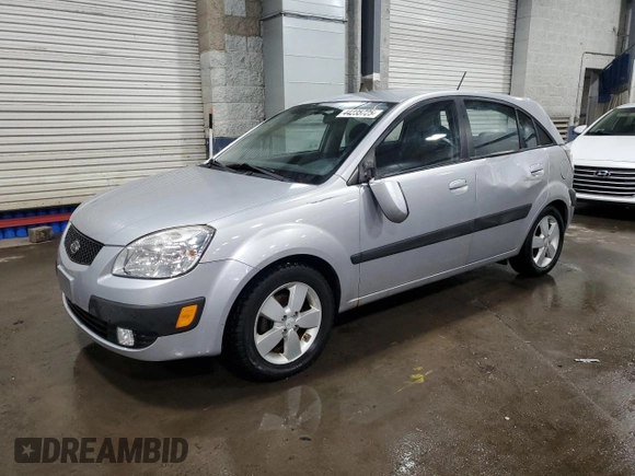 2009 Kia Rio LX with VIN KNADE243196496923, listed as a Copart auction lot 44235725 with 103,171 mi miles and Salvage Title. Bid and sale history available at carsss.com. Image 1.