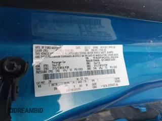 2013 Ford Focus SE with VIN 1FADP3K23DL352304, listed as a IAAI auction lot 41999944 with 106,559 mi miles. Bid and sale history available at carsss.com. Image 9.