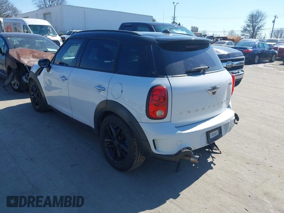 2014 MINI Countryman S with VIN WMWZC3C52EWP25060, listed as a IAAI auction lot 41642855 with 240,396 mi miles and . Bid and sale history available at DreamBid. Image 3.