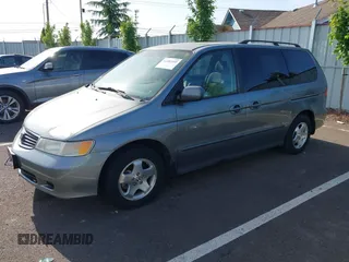 2000 Honda Odyssey EX z VIN 2HKRL1869YH531628, wystawiony jako IAAI lot #42482459 z przebiegiem 117 118 mil mil oraz . Historia ofert i sprzedaży dostępna na DreamBid. Obrazek 2.
