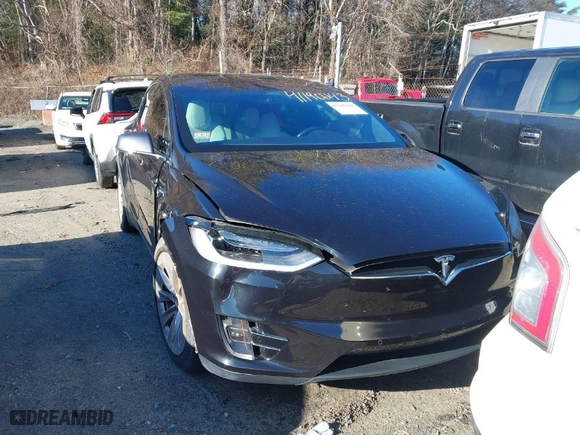 2017 Tesla Model X P100D with VIN 5YJXCDE4XHF055805, listed as a IAAI auction lot 41190243 with NaN miles. Bid and sale history available at carsss.com. Image 12.