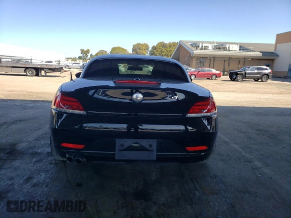 2015 BMW Z4 sDrive28i with VIN WBALL5C54FP557175, listed as a Copart auction lot 48906195 with 28,275 mi miles and Salvage Title. Bid and sale history available at carsss.com. Image 6.