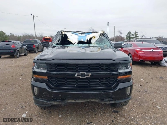 2016 Chevrolet Silverado 1500 LT with VIN 3GCUKREC6GG353660, listed as a IAAI auction lot 41240370 with 130,448 mi miles. Bid and sale history available at carsss.com. Image 6.