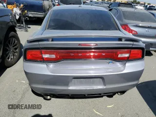 2014 Dodge Charger RT Plus with VIN 2C3CDXCT4EH307940, listed as a Copart auction lot 64035484 with 129,665 mi miles and Salvage Title. Bid and sale history available at carsss.com. Image 6.