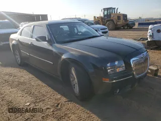 2006 Chrysler 300 Touring with VIN 2C3LA53G06H125654, listed as a Copart auction lot 71224414 with 145,759 mi miles and Salvage Title. Bid and sale history available at carsss.com. Image 4.