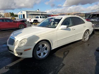 2007 Mercedes-Benz E 550 with VIN WDBUF90X77X212587, listed as a Copart auction lot 79753664 with 111,768 mi miles and Salvage Title. Bid and sale history available at carsss.com. Image 1.