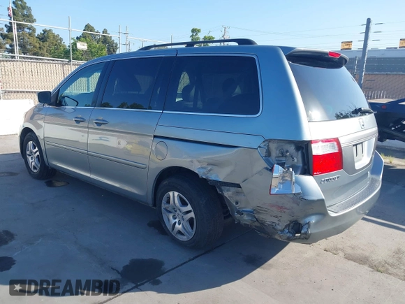 2007 Honda Odyssey EX-L with VIN 5FNRL38727B028976, listed as a IAAI auction lot 42138341 with 169,936 mi miles. Bid and sale history available at carsss.com. Image 3.