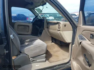 2004 Chevrolet Tahoe LT with VIN 1GNEC13Z84R209220, listed as a IAAI auction lot 41867643 with 385,229 mi miles. Bid and sale history available at carsss.com. Image 5.