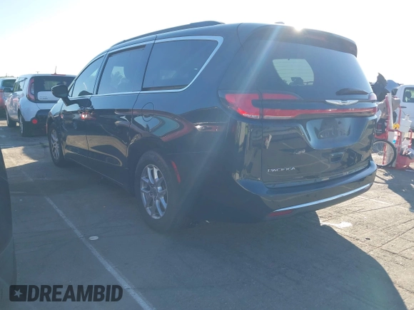 2022 Chrysler Pacifica Touring L with VIN 2C4RC1BG9NR117538, listed as a IAAI auction lot 42318518 with 103,311 mi miles and . Bid and sale history available at DreamBid. Image 3.