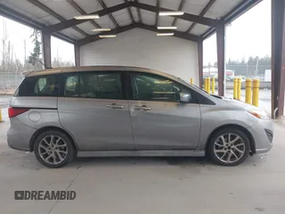 2012 Mazda Mazda5 Grand Touring with VIN JM1CW2DL7C0143303, listed as a IAAI auction lot 41924227 with 126,689 mi miles. Bid and sale history available at carsss.com. Image 13.