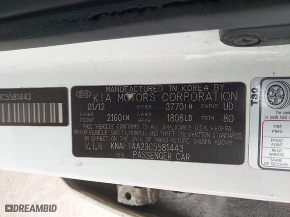 2012 Kia Forte LX with VIN KNAFT4A23C5581443, listed as a IAAI auction lot 41697825 with 115,184 mi miles. Bid and sale history available at carsss.com. Image 9.