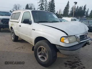 2000 Mazda B-Series 2WD Truck SX with VIN 4F4YR12C4YTM29858, listed as a IAAI auction lot 41473810 with 261,518 mi miles. Bid and sale history available at carsss.com. Image 1.