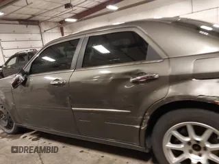 2010 Chrysler 300 Touring with VIN 2C3CA5CV9AH213299, listed as a IAAI auction lot 41754215 with 172,467 mi miles. Bid and sale history available at carsss.com. Image 15.