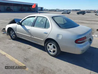 1997 Nissan Altima XE with VIN 1N4BU31D4VC221788, listed as a IAAI auction lot 41356945 with 136,931 mi miles. Bid and sale history available at carsss.com. Image 3.