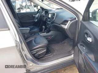 2015 Jeep Cherokee Trailhawk z VIN 1C4PJMBS5FW615313, wystawiony jako IAAI lot #42250873 z przebiegiem 148 008 mil mil oraz . Historia ofert i sprzedaży dostępna na DreamBid. Obrazek 5.