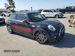 2015 MINI Hardtop S with VIN WMWXP7C55F2A35365, listed as a Copart auction lot 55442815 with 80,714 mi miles and Salvage Title. Bid and sale history available at DreamBid. Image 4.