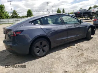 2023 Tesla Model 3 z VIN 5YJ3E1EA3PF546695, wystawiony jako Copart lot #57075155 z przebiegiem 35 871 mil mil oraz Szkoda całkowita • Salvage title. Historia ofert i sprzedaży dostępna na DreamBid. Obrazek 3.