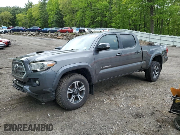 2017 Toyota Tacoma SR5 z VIN 3TMDZ5BN6HM017990, wystawiony jako Copart lot #57982205 z przebiegiem 51 890 mil mil oraz Szkoda całkowita • Salvage title. Historia ofert i sprzedaży dostępna na DreamBid. Obrazek 1.
