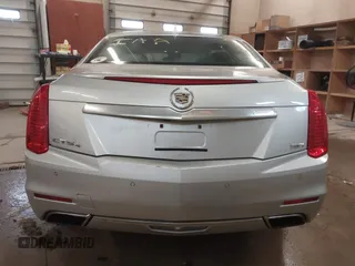 2014 Cadillac CTS Luxury AWD with VIN 1G6AX5S3XE0158960, listed as a IAAI auction lot 41258609 with 84,360 mi miles and . Bid and sale history available at DreamBid. Image 16.