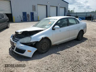 2009 Volkswagen Jetta S with VIN 3VWJM71K09M064791, listed as a Copart auction lot 61534475 with 179,213 mi miles and Salvage title. Bid and sale history available at DreamBid. Image 1.