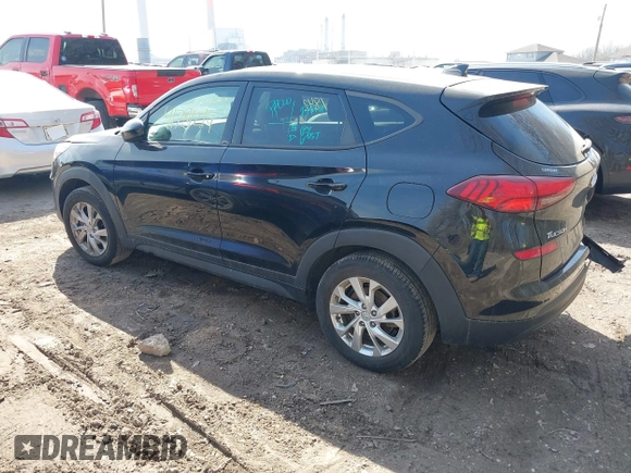 2019 Hyundai Tucson SE with VIN KM8J2CA4XKU852946, listed as a IAAI auction lot 41784214 with 120,857 mi miles. Bid and sale history available at carsss.com. Image 3.