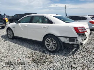 2016 Ford Taurus Limited with VIN 1FAHP2F85GG140107, listed as a Copart auction lot 66093895 with 72,614 mi miles and Salvage title. Bid and sale history available at DreamBid. Image 2.