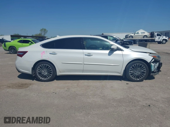 2016 Toyota Avalon Limited with VIN 4T1BK1EB7GU241409, listed as a IAAI auction lot 42013546 with 142,786 mi miles and . Bid and sale history available at carsss.com. Image 14.