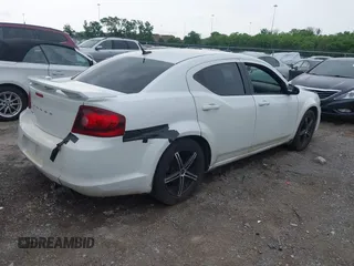 2013 Dodge Avenger SE with VIN 1C3CDZABXDN530463, listed as a IAAI auction lot 42176381 with 187,476 mi miles and . Bid and sale history available at DreamBid. Image 4.