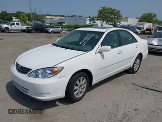 2002 Toyota Camry XLE z VIN 4T1BF30K22U007310, wystawiony jako IAAI lot #42419765 z przebiegiem 206 050 mil mil oraz . Historia ofert i sprzedaży dostępna na DreamBid. Obrazek 2.