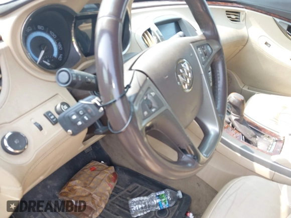 2012 Buick LaCrosse Premium 1 z VIN 1G4GD5E32CF113903, wystawiony jako IAAI lot #42454096 z przebiegiem 133 803 mil mil oraz . Historia ofert i sprzedaży dostępna na DreamBid. Obrazek 11.