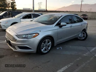 2018 Ford Fusion Hybrid SE with VIN 3FA6P0LU1JR154373, listed as a Copart auction lot 82924614 with 133,065 mi miles and Salvage Title. Bid and sale history available at carsss.com. Image 1.