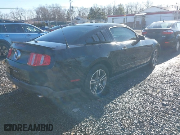 2012 Ford Mustang Premium with VIN 1ZVBP8AM4C5210870, listed as a IAAI auction lot 41521473 with 113,376 mi miles and . Bid and sale history available at DreamBid. Image 4.