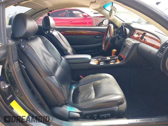 2005 Lexus SC 430 z VIN JTHFN48Y550062562, wystawiony jako IAAI lot #42437298 z przebiegiem 119 744 mil mil oraz . Historia ofert i sprzedaży dostępna na DreamBid. Obrazek 5.