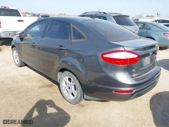2016 Ford Fiesta SE with VIN 3FADP4BJ1GM143160, listed as a IAAI auction lot 41789400 with 96,908 mi miles. Bid and sale history available at carsss.com. Image 3.