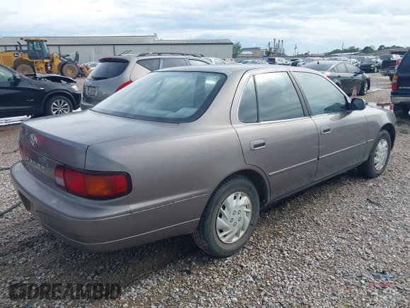 1996 Toyota Camry DX with VIN JT2BG12K1T0356821, listed as a IAAI auction lot 41860018 with 278,326 mi miles. Bid and sale history available at carsss.com. Image 4.