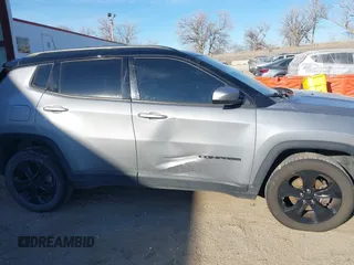 2018 Jeep Compass Latitude with VIN 3C4NJDBB1JT326239, listed as a IAAI auction lot 41325854 with 79,192 mi miles and . Bid and sale history available at DreamBid. Image 13.