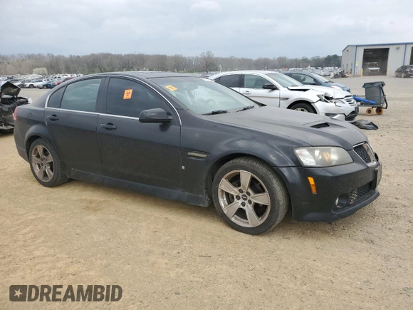 2009 Pontiac G8 z VIN 6G2ER57709L240146, wystawiony jako Copart lot #49223415 z przebiegiem 203 008 mil mil oraz Czysty tytuł • Clean title. Historia ofert i sprzedaży dostępna na DreamBid. Obrazek 4.