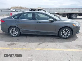 2017 Ford Fusion SE with VIN 3FA6P0H7XHR228922, listed as a IAAI auction lot 42162345 with 186,000 mi miles and . Bid and sale history available at DreamBid. Image 13.