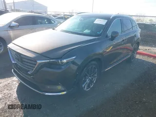 2016 Mazda CX-9 Grand Touring z VIN JM3TCBDY3G0104001, wystawiony jako IAAI lot #41961054 z przebiegiem 77 057 mil mil oraz . Historia ofert i sprzedaży dostępna na DreamBid. Obrazek 17.