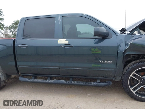 2018 Chevrolet Silverado 1500 LT with VIN 3GCPCREC1JG497019, listed as a IAAI auction lot 41459936 with 52,691 mi miles and . Bid and sale history available at DreamBid. Image 13.