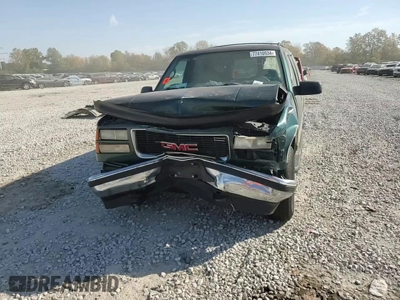 1997 GMC Suburban z VIN 3GKFK16R7VG514905, wystawiony jako Copart lot #77410934 z przebiegiem 193 116 mil mil oraz Szkoda całkowita • Salvage title. Historia ofert i sprzedaży dostępna na DreamBid. Obrazek 12.
