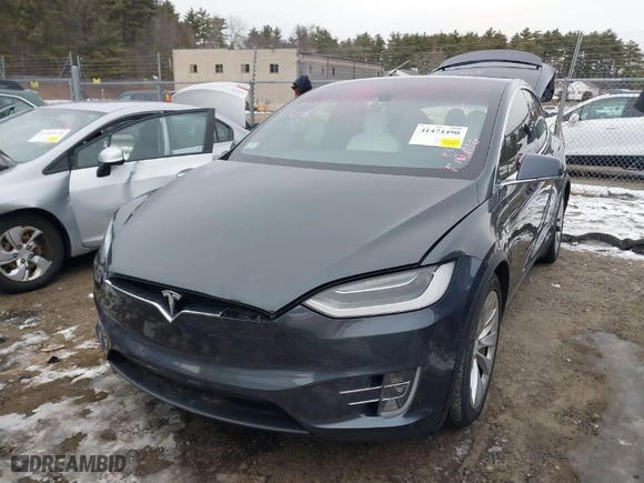 2016 Tesla Model X 70D with VIN 5YJXCAE2XGF014165, listed as a IAAI auction lot 41474490 with 112,967 mi miles. Bid and sale history available at carsss.com. Image 2.