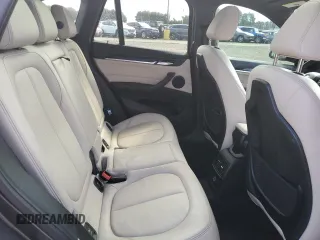 2016 BMW X1 xDrive28i z VIN WBXHT3Z39G4A50798, wystawiony jako Copart lot #50827875 z przebiegiem 114 178 mil mil oraz Szkoda całkowita • Salvage title. Historia ofert i sprzedaży dostępna na DreamBid. Obrazek 11.