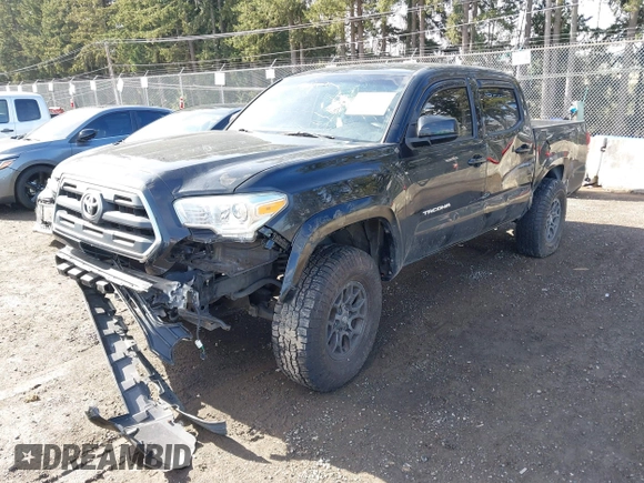 2017 Toyota Tacoma SR5 with VIN 5TFAZ5CN3HX040199, listed as a IAAI auction lot 41734051 with 107,665 mi miles and . Bid and sale history available at carsss.com. Image 2.