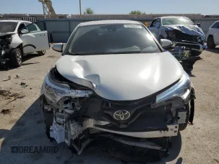2019 Toyota C-HR XLE with VIN NMTKHMBX2KR098238, listed as a Copart auction lot 52338025 with 57,933 mi miles and Salvage Title. Bid and sale history available at DreamBid. Image 5.