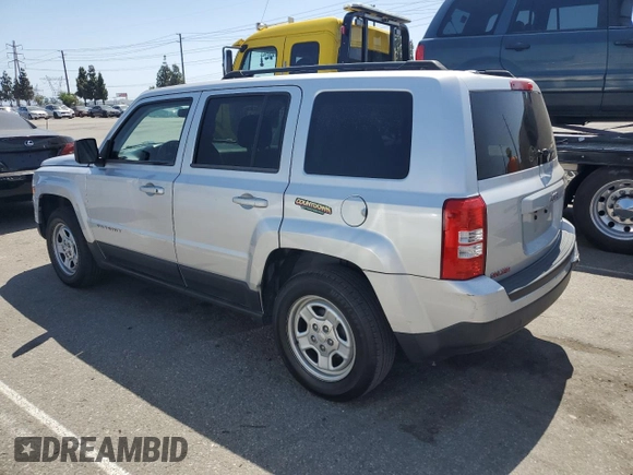 2014 Jeep Patriot Sport with VIN 1C4NJPBB1ED512442, listed as a Copart auction lot 61415565 with 211,715 mi miles and Salvage title. Bid and sale history available at DreamBid. Image 2.