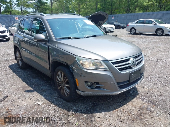 2010 Volkswagen Tiguan S with VIN WVGBV7AX1AW532415, listed as a IAAI auction lot 42561683 with 106,147 mi miles and . Bid and sale history available at DreamBid. Image 1.