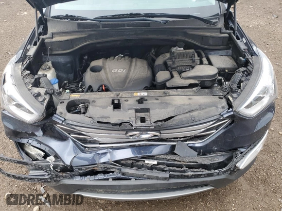 2016 Hyundai Santa Fe z VIN 5XYZU3LB6GG351980, wystawiony jako Copart lot #55326225 z przebiegiem 60 007 mil mil oraz Szkoda całkowita • Salvage title. Historia ofert i sprzedaży dostępna na DreamBid. Obrazek 11.