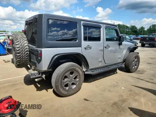 2016 Jeep Wrangler Unlimited Sahara with VIN 1C4BJWEG6GL168944, listed as a Copart auction lot 61650615 with 66,016 mi miles and Salvage title. Bid and sale history available at DreamBid. Image 3.